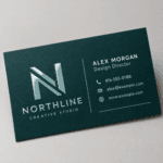 Custom raised Spot UV business cards with glossy elevated highlights on selected design areas by Printomatic.