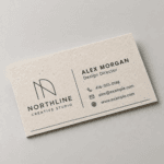 Custom enviro business cards printed on eco-friendly stock with a natural, professional finish by Printomatic.